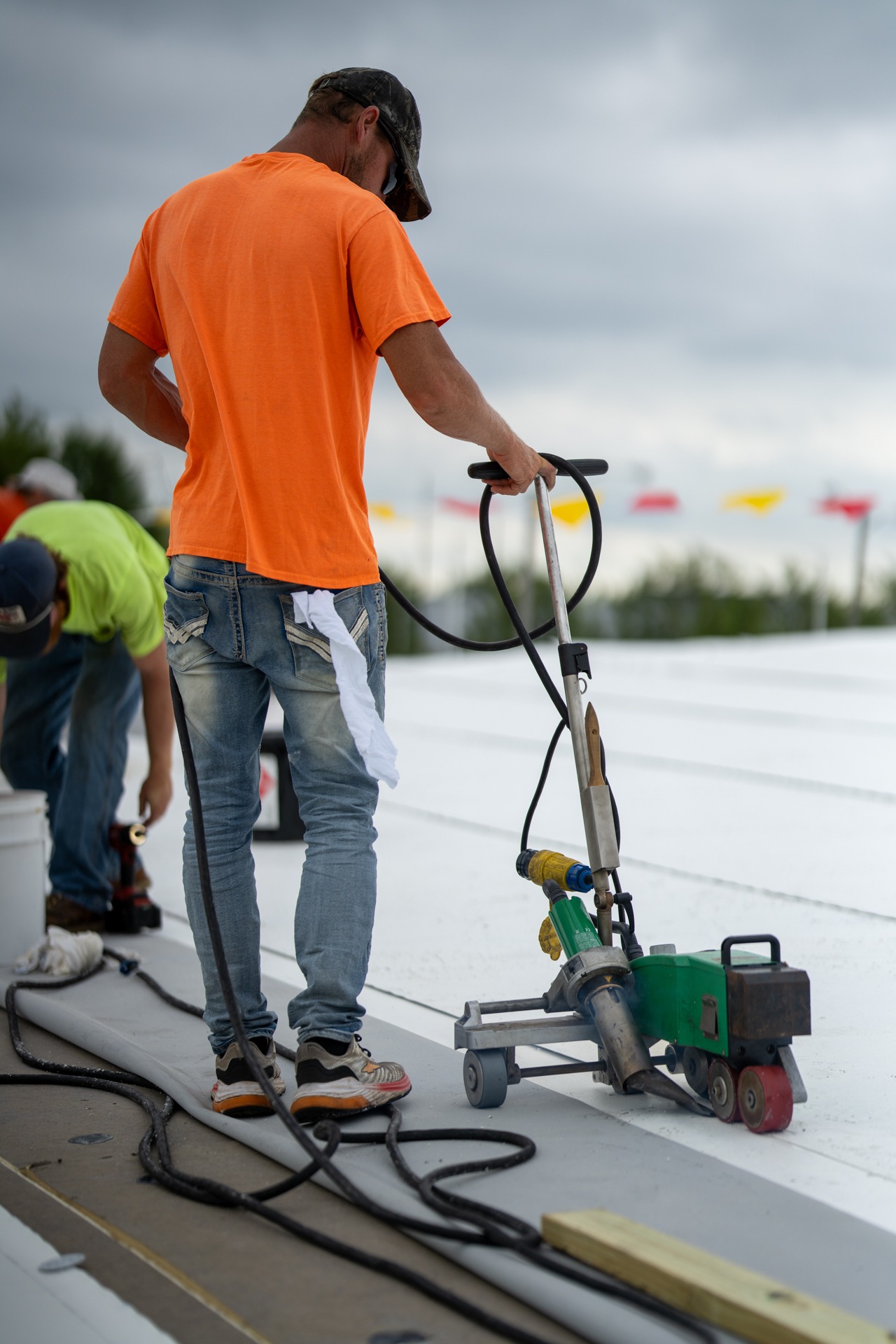 HCI commercial flat roof — single ply membrane, hot air welding, seam welding